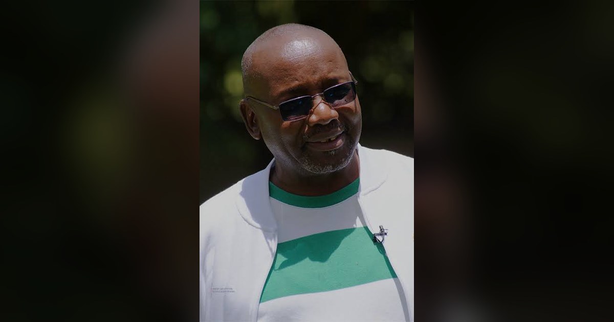 Barnaba Korir, NOC-K first vice president, in a white and green top